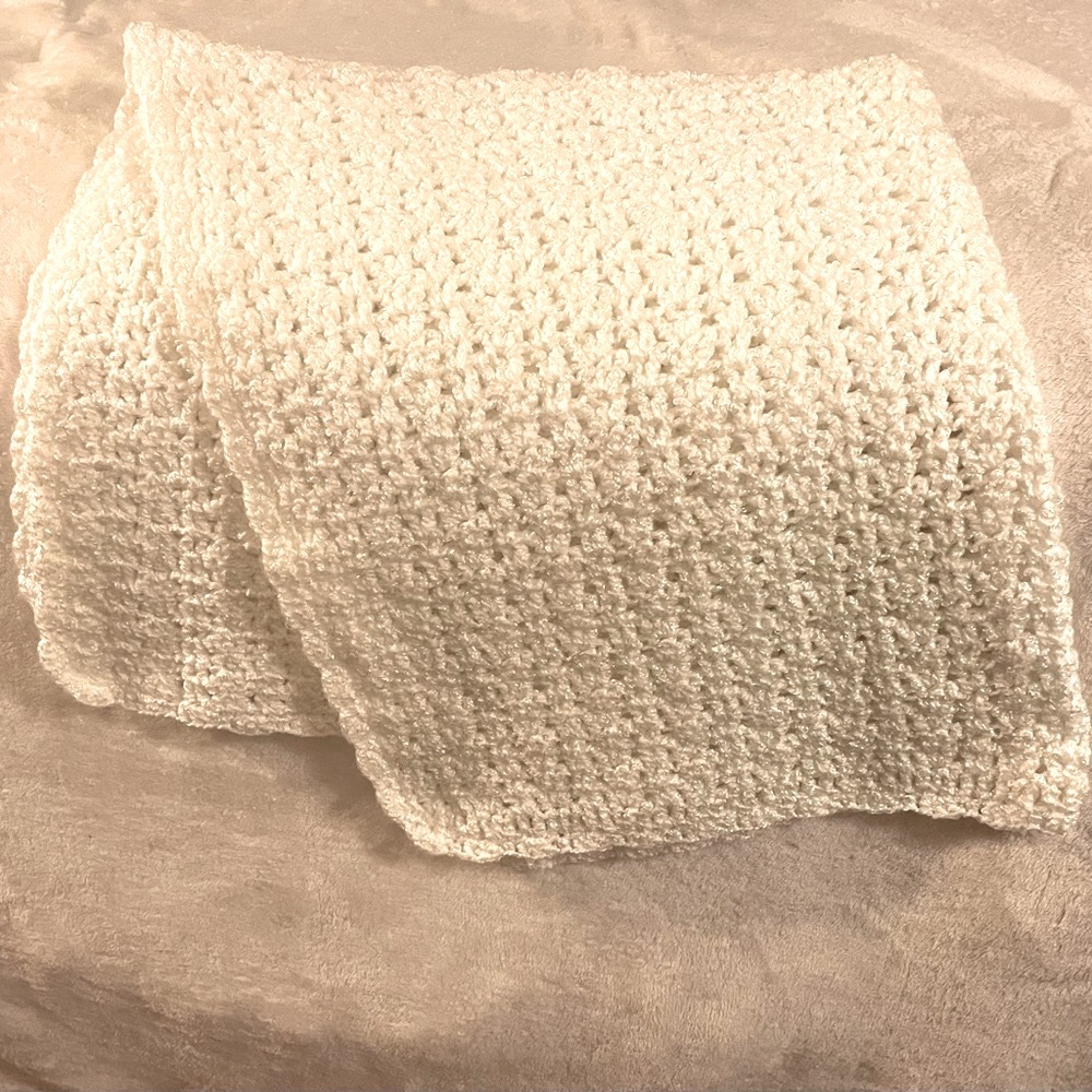 Crocheted baby blanket.